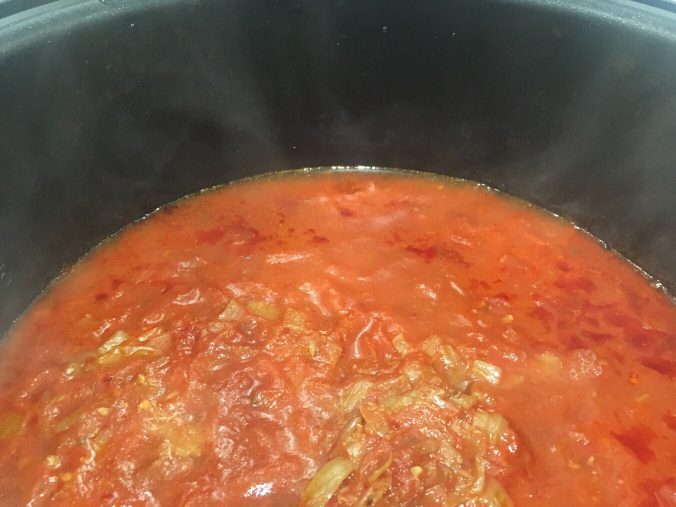 tomato sauce cooking in the slow cooker
